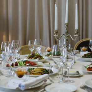Elegant Catering Table Set Service with Silverware, Napkin and Glass at Restaurant Before Party